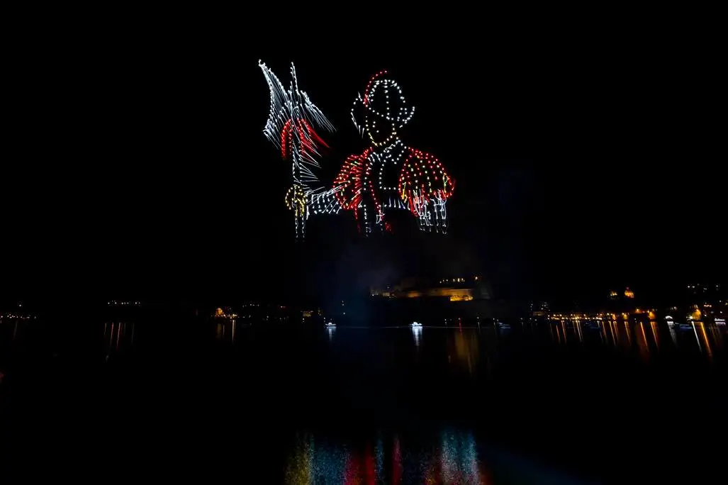 Drones form an iconic Maltese knight over St. Paul's Bay